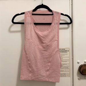 Lululemon pink workout tank. Wide cut sleeves. Size S